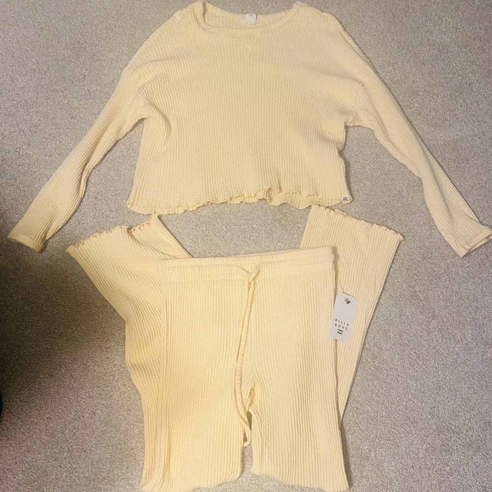 New Billabong ribbed yellow crop top and pants w/ ruffle on ends that flare out.